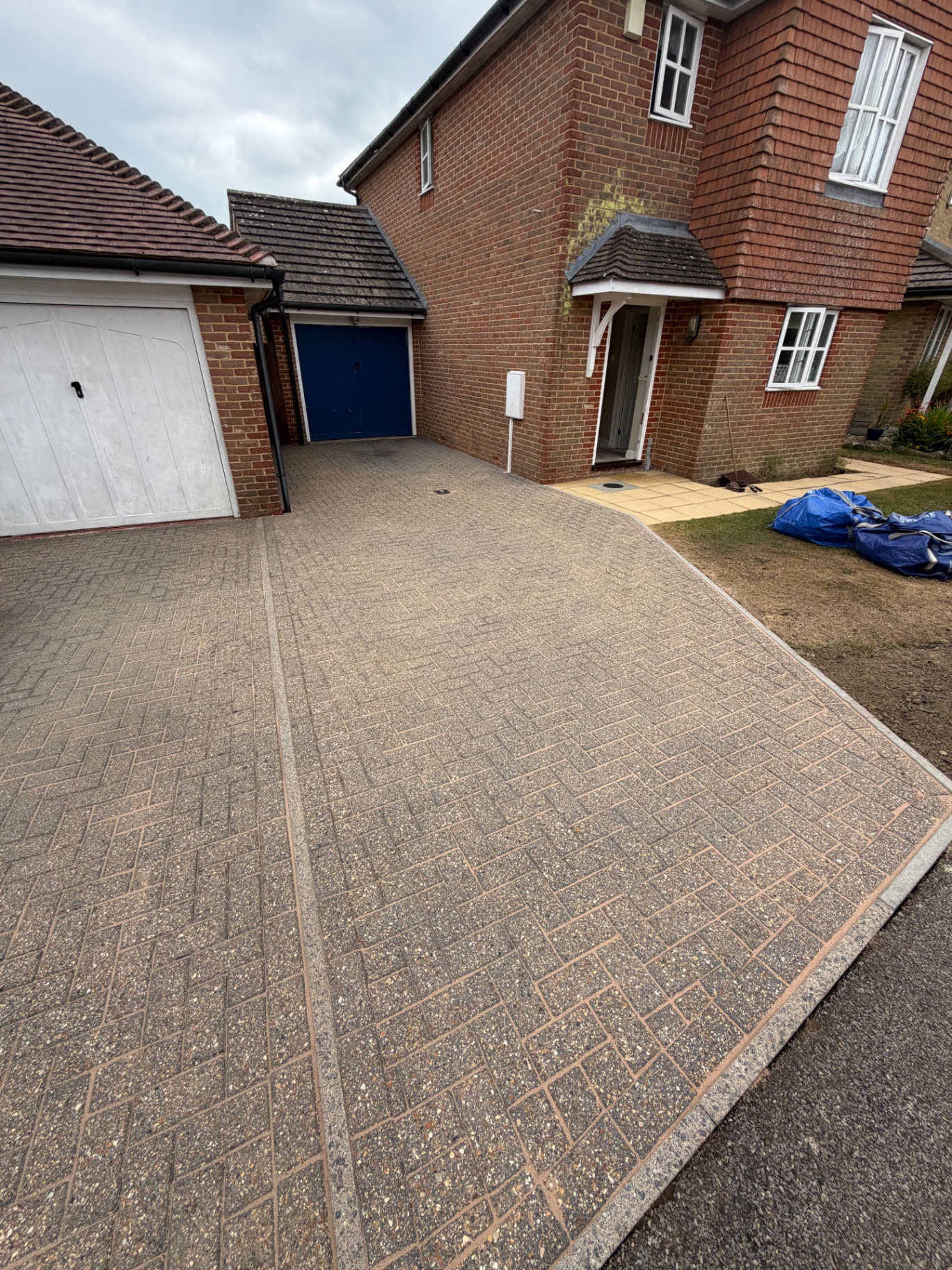 Herringbone block-paved driveway