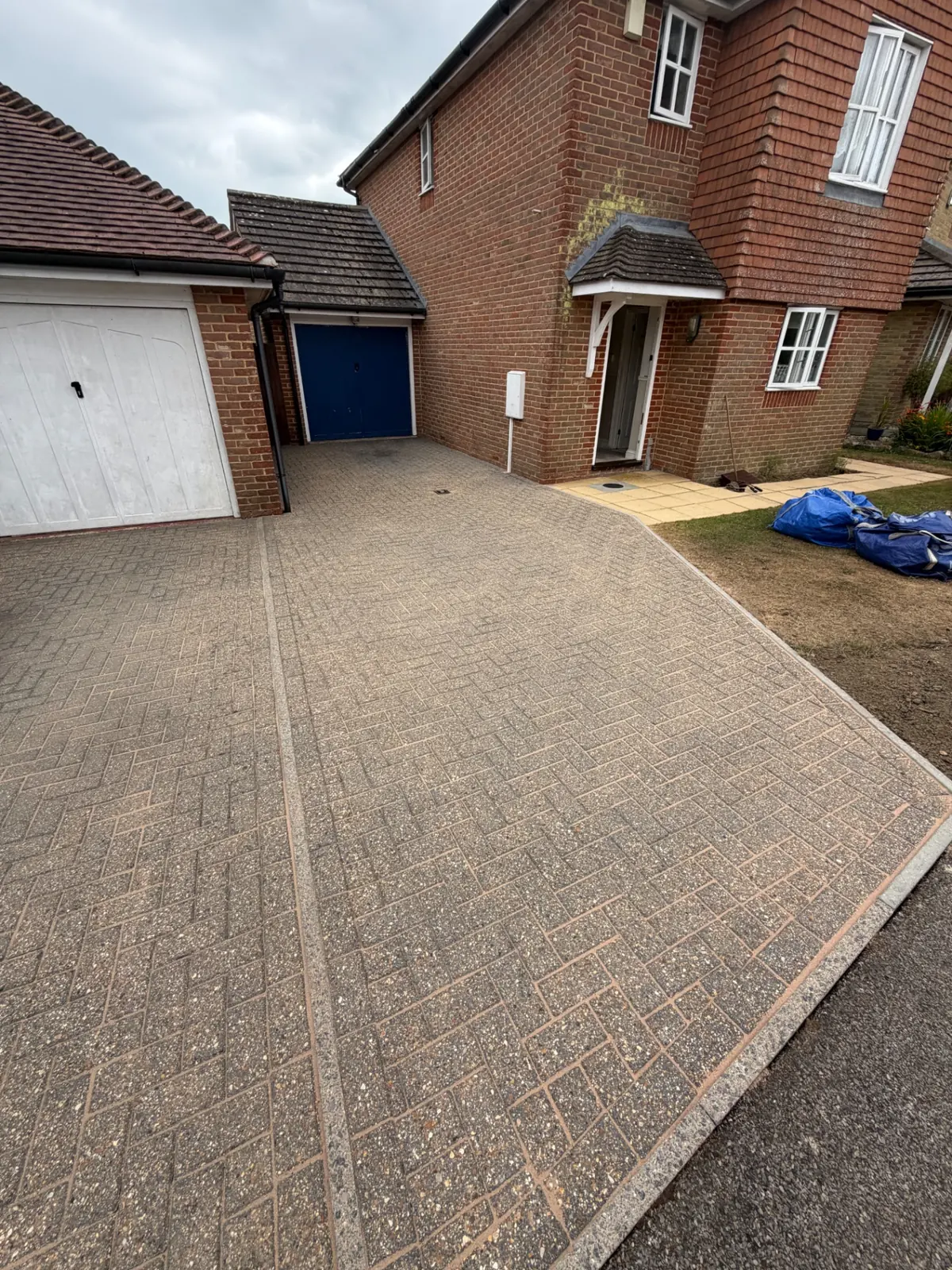 Herringbone block-paved driveway