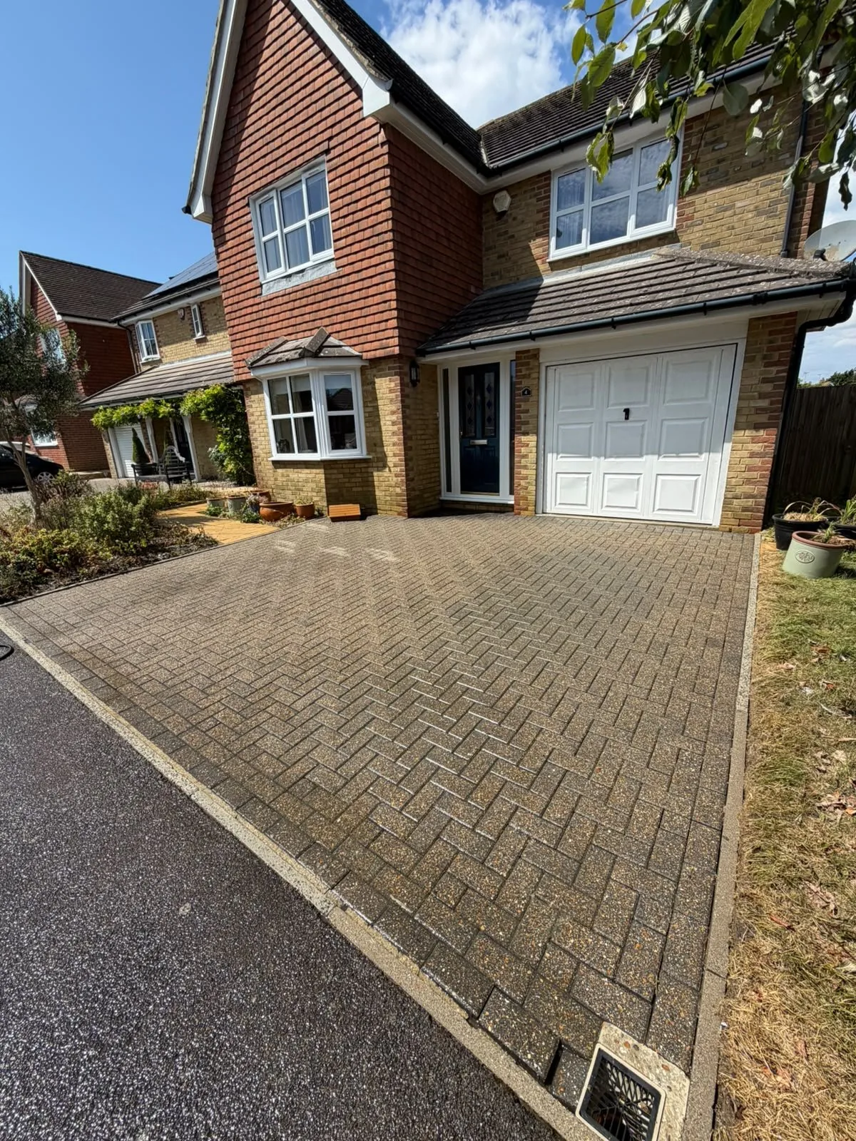 The same block-paved domestic driveway after cleaning