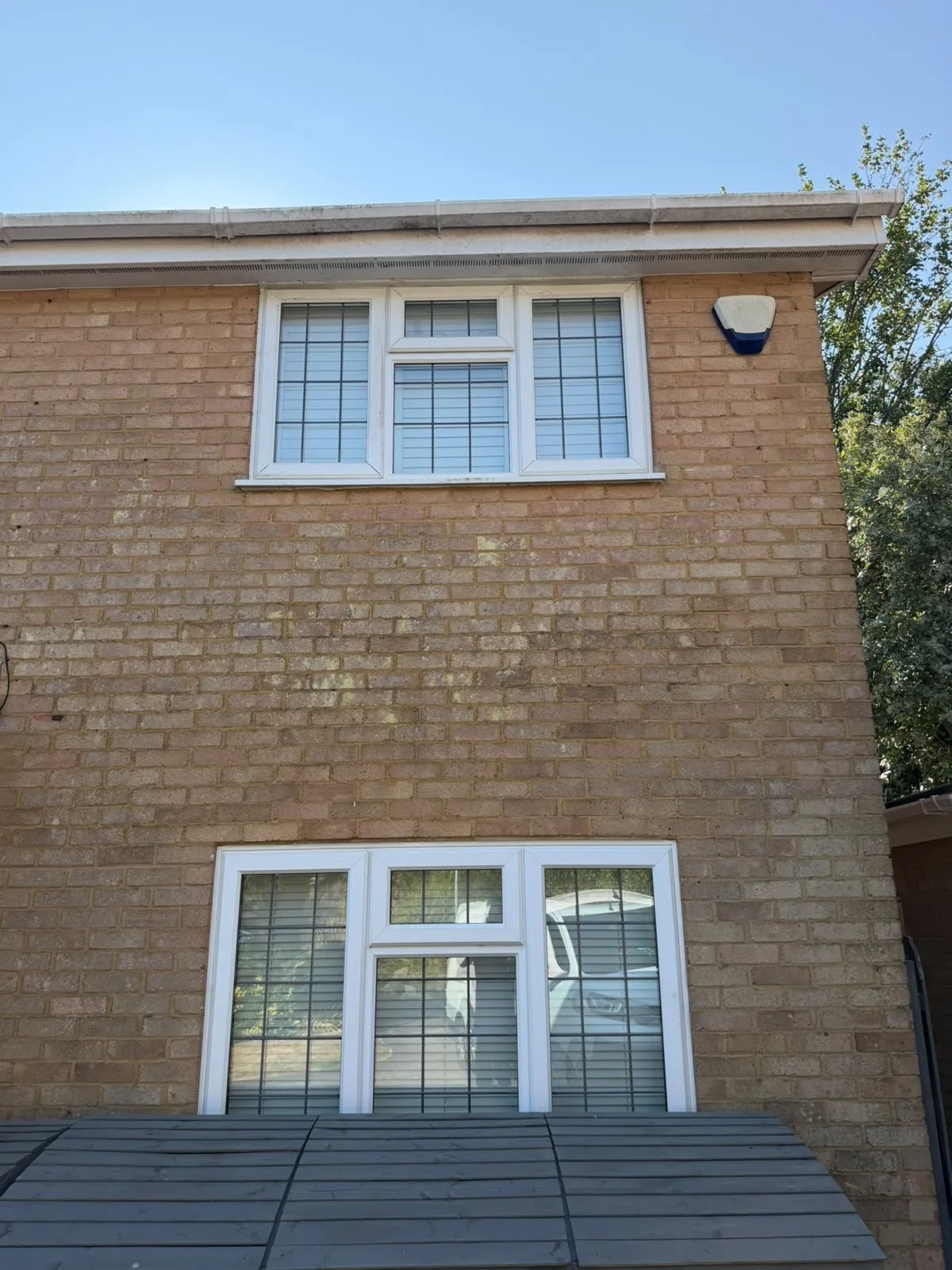 Second view of domestic guttering and fascia before cleaning