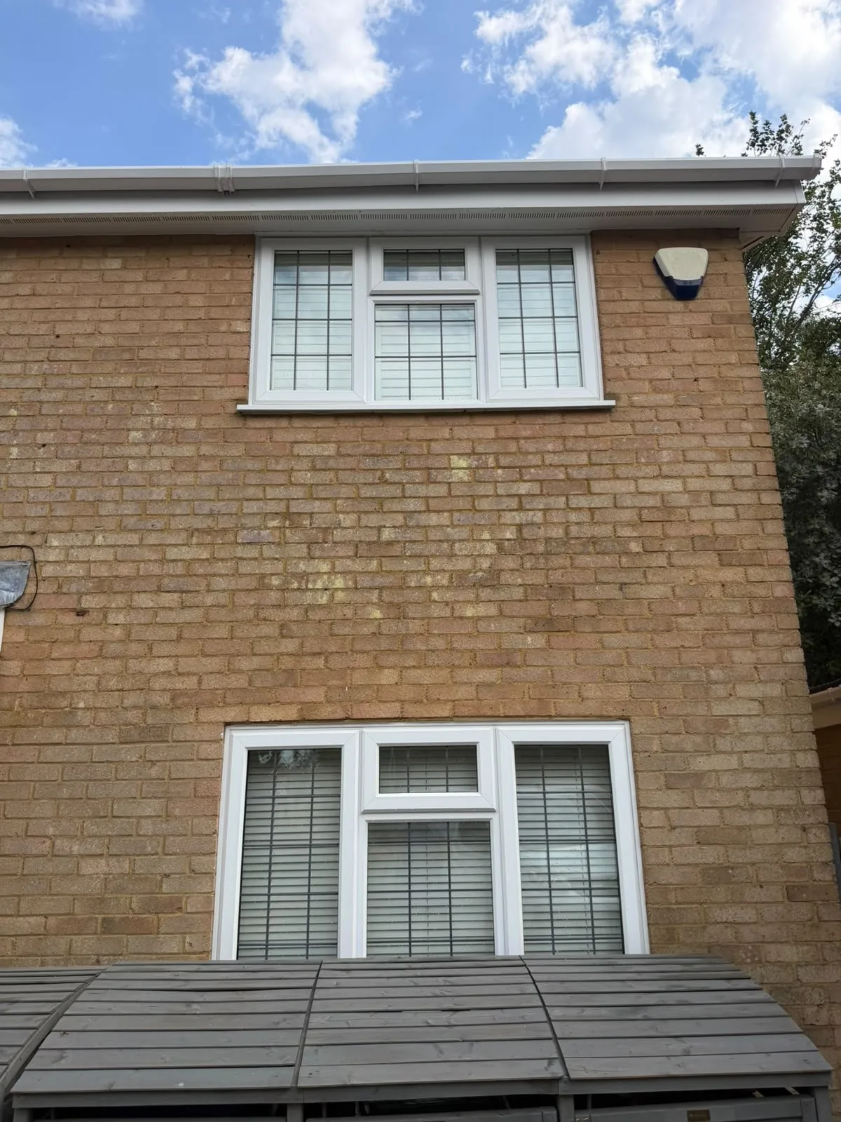 The same view of domestic guttering and fascia after cleaning